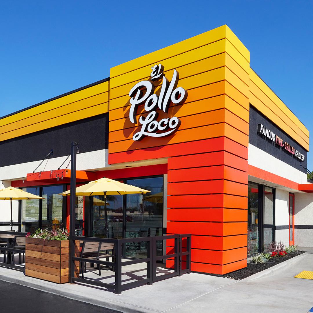 Car picking up food in drive thru of restaurant