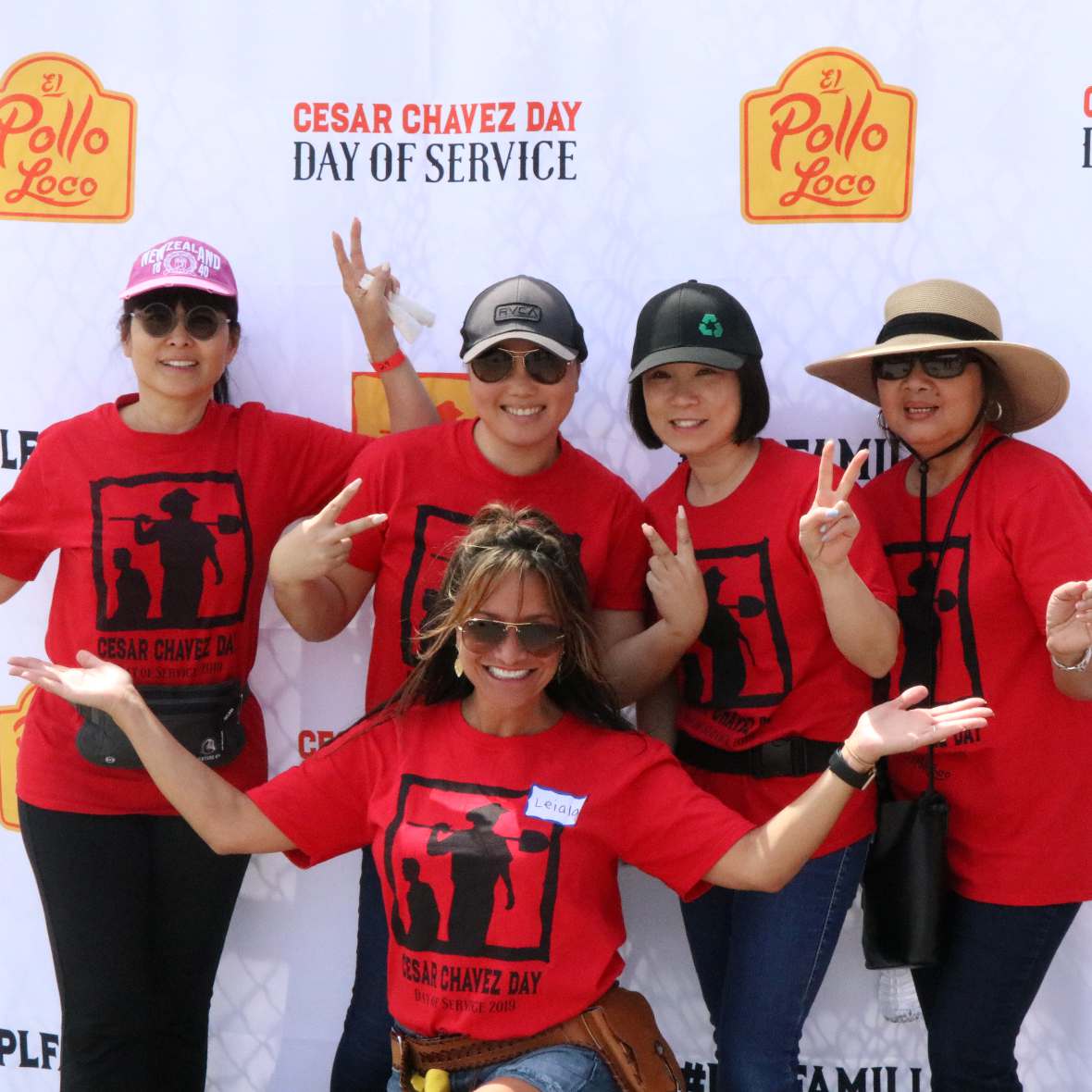 El Pollo Loco volunteer employees at an outdoor event.