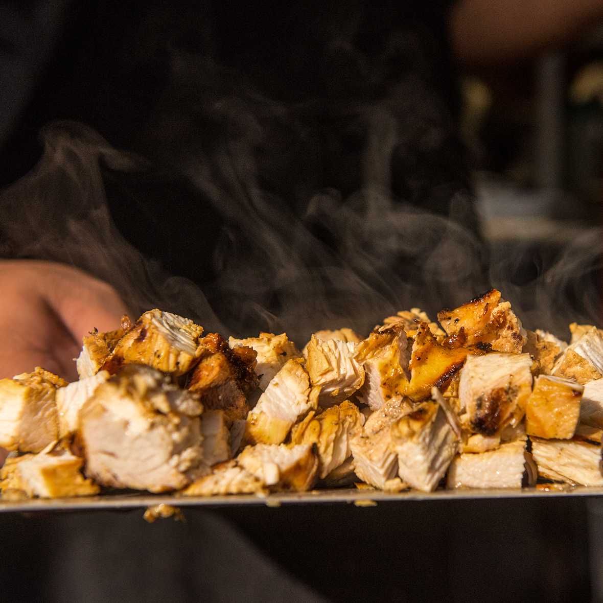 Fresh chopped, steaming hot, delicious El Pollo Loco chicken.