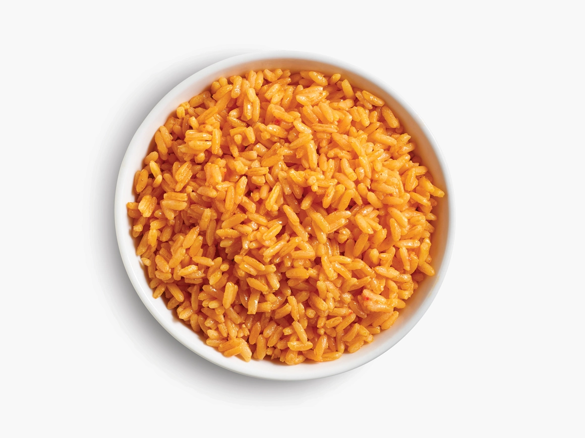 Bowls of rice, corn, salsa, and glass of cola