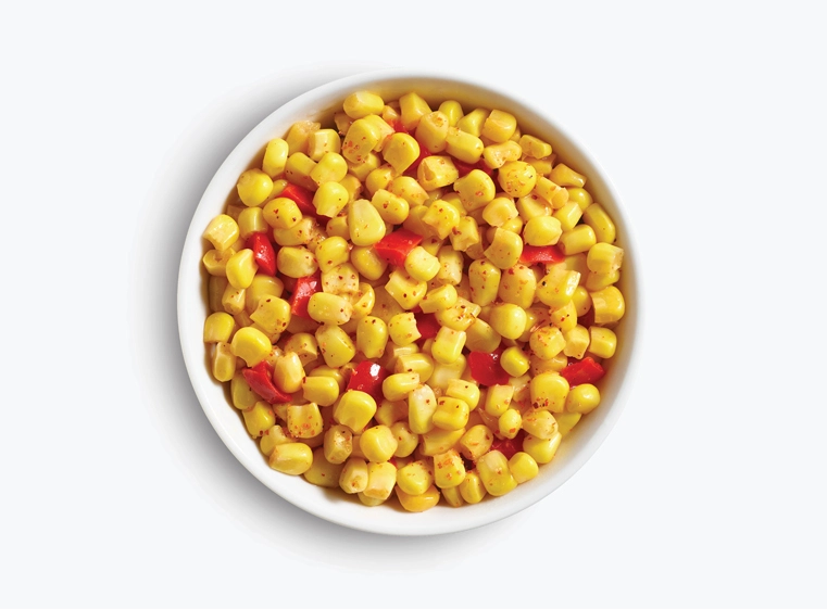 Bowl of cut corn and diced red peppers