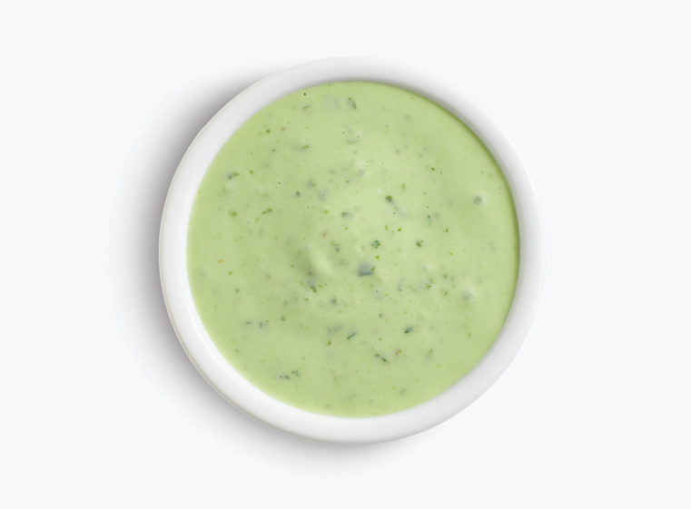 Side ramekin of creamy cilantro dressing