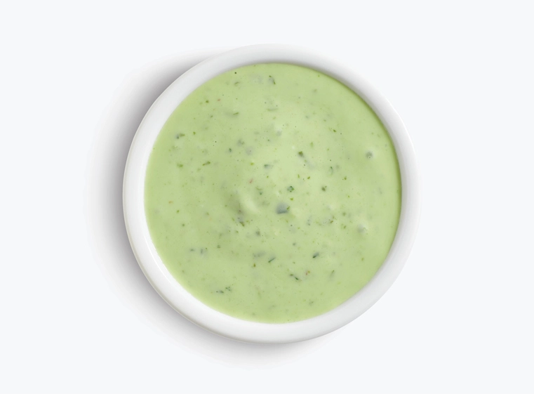 Side ramekin of creamy cilantro dressing
