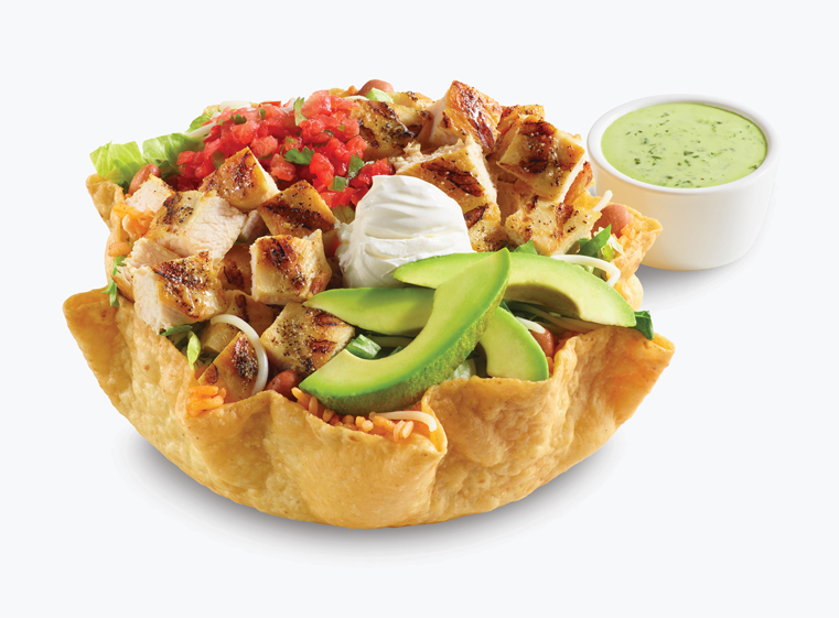 Double Chicken Tostada in tostada shell topped with avocado