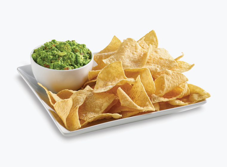 Tortilla chips with side of guacamole