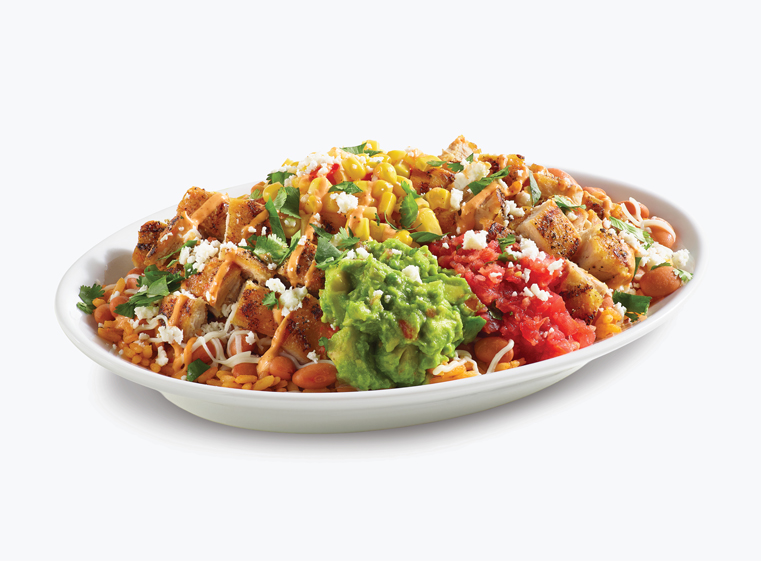 Street corn burrito bowl in a black bowl