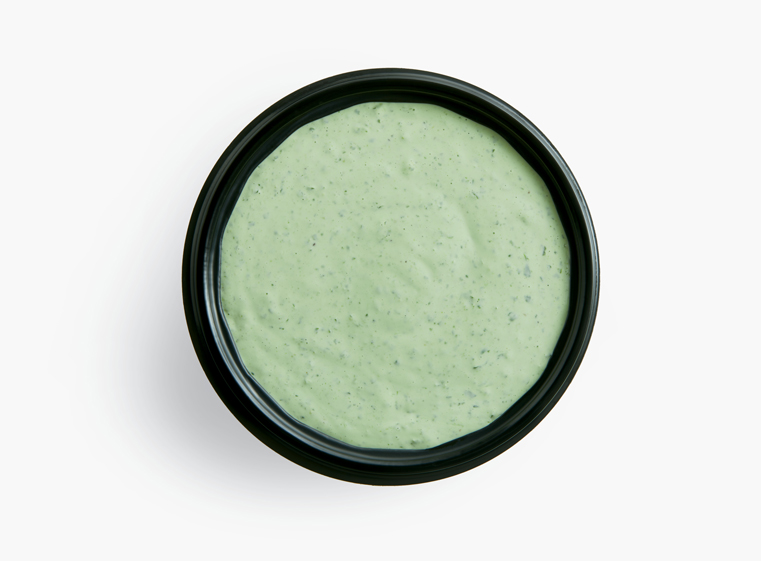 Side ramekin of creamy cilantro dressing