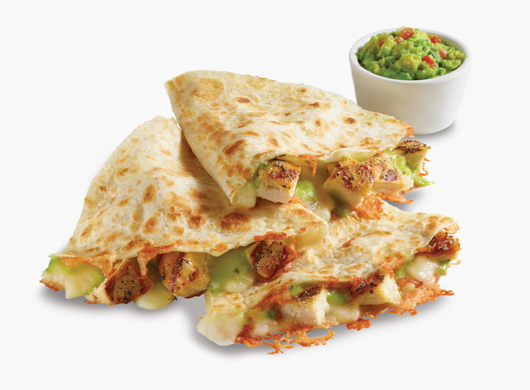 Salsa Verde Quesadilla with a side of guacamole in a white ramiken