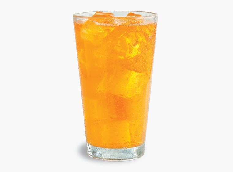 Glass of Orange Fanta on ice