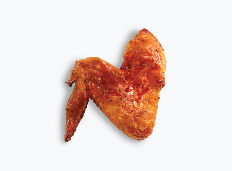 One chicken wing with mango habanero sauce