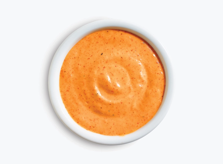 Pollo Loco Sauce in a white ramekin