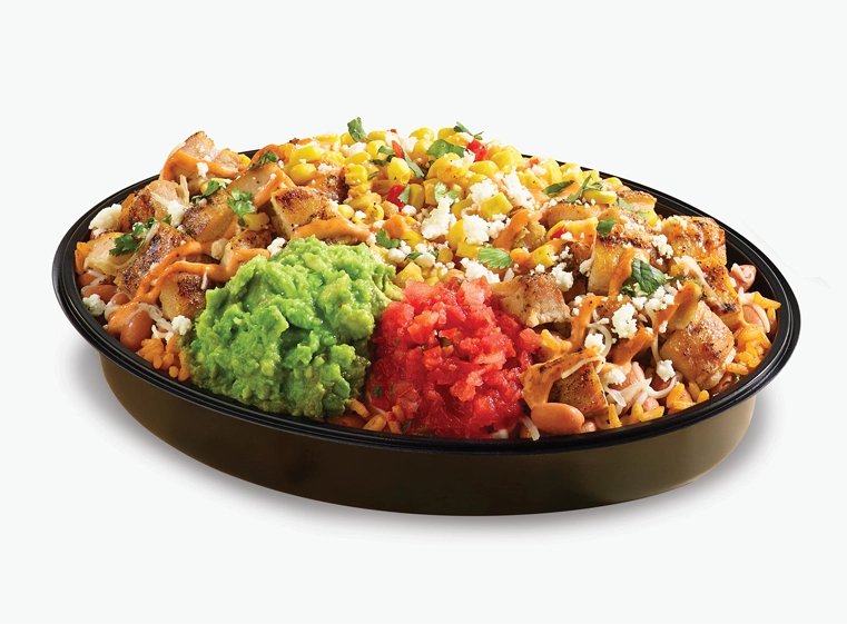 Street corn burrito bowl in a black bowl