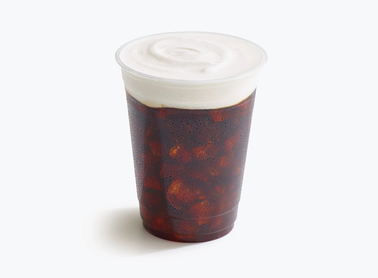 Iced coffee cream in a clear plastic cup