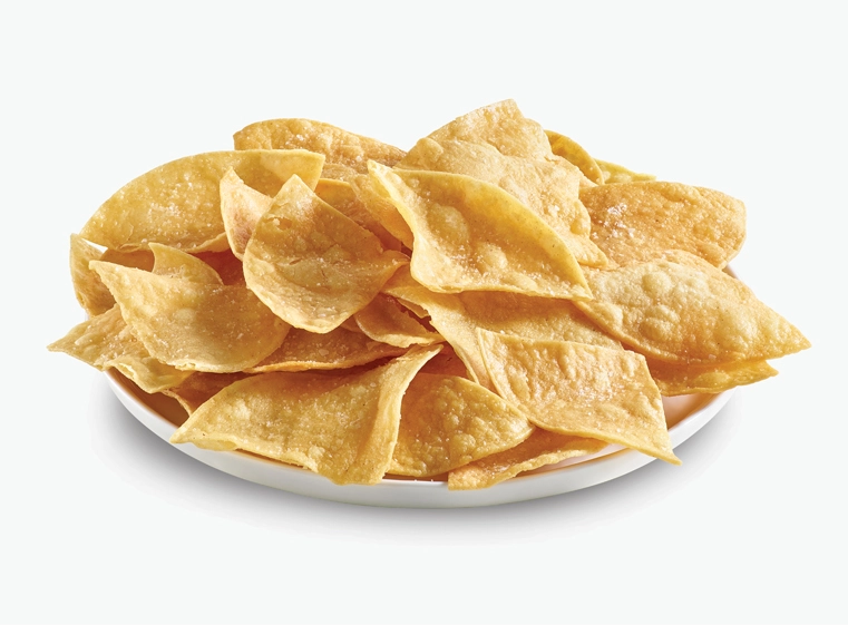Tortilla chips served on plate