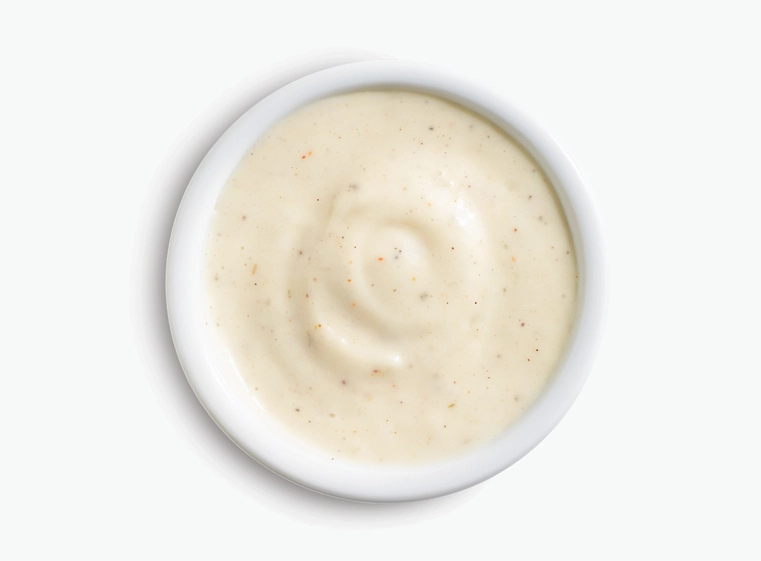 ranch dressing in a white ramekin