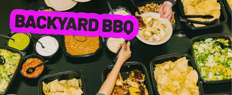 Backyard-bbq-challenge-catering-1.webp Family meal spread at a backyard BBQ